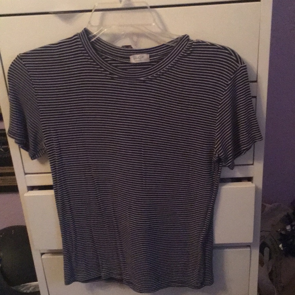 A tight fitting cropped striped shirt